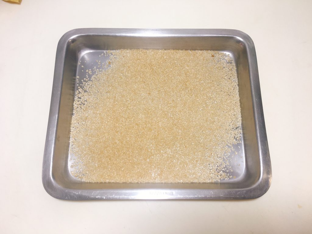Pour the brown sugar into the tray