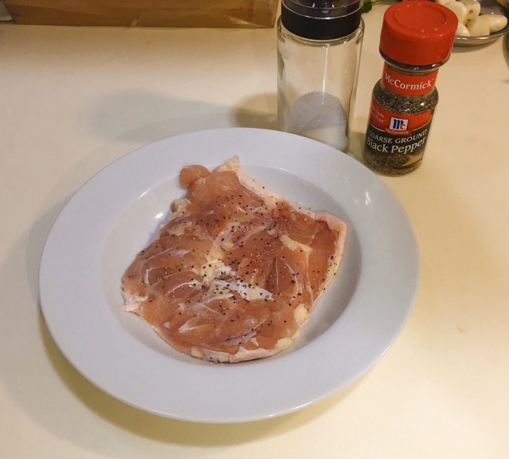 Sprinkle the chicken thigh with salt and pepper